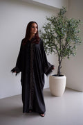 Satijnen Abaya met strass en veren.